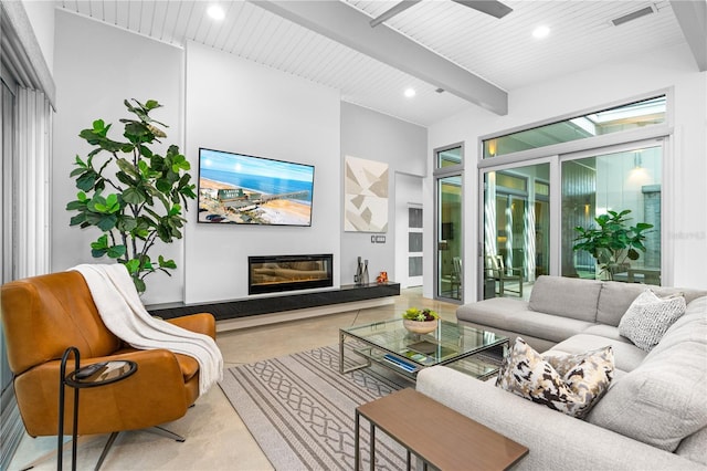 living room featuring wooden ceiling, beam ceiling, and concrete floors