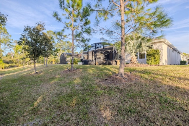 view of yard featuring a lanai