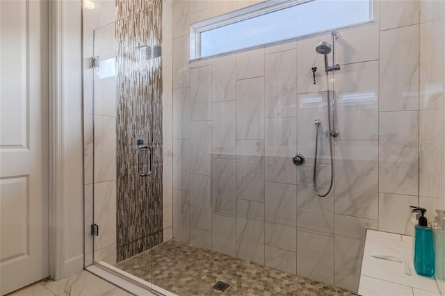 bathroom with an enclosed shower