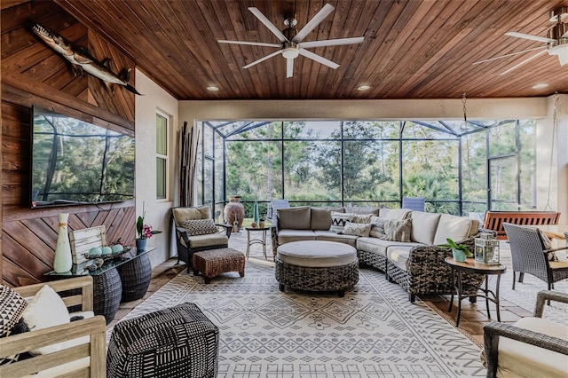 sunroom with wooden ceiling and ceiling fan