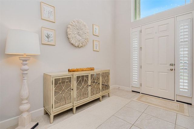 view of tiled foyer entrance