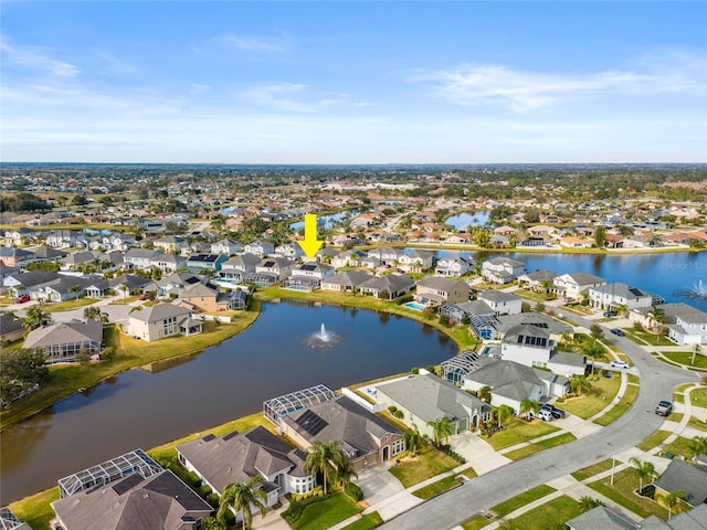 drone / aerial view with a water view