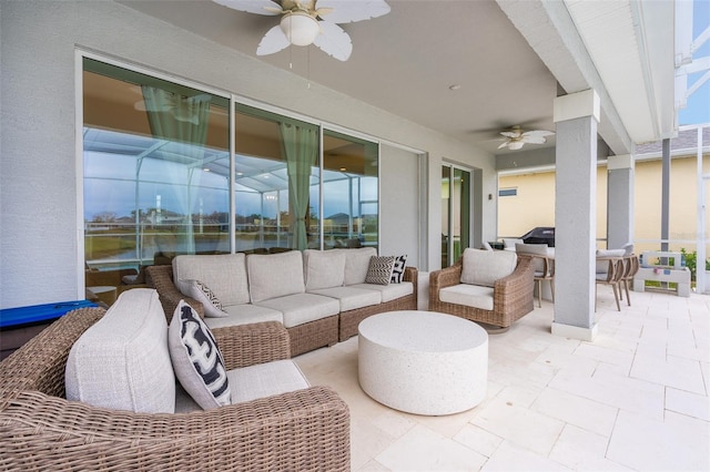 view of patio / terrace with a lanai, an outdoor hangout area, and ceiling fan