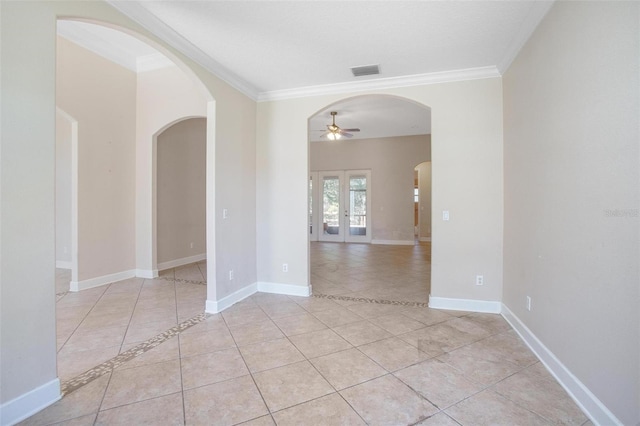 unfurnished room featuring crown molding, french doors, ceiling fan, and light tile patterned flooring