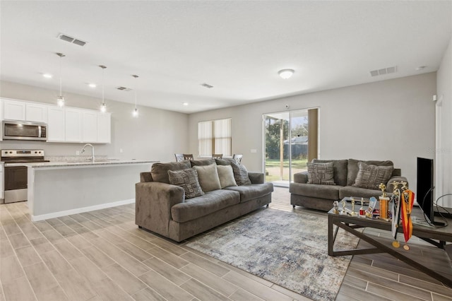 living room with sink