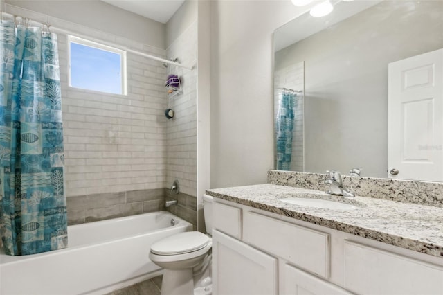 full bathroom with shower / tub combo, vanity, and toilet