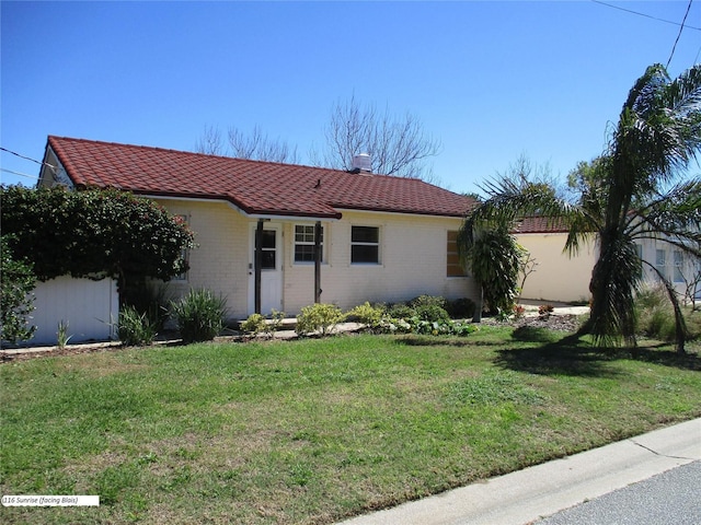 view of front of home with a front yard