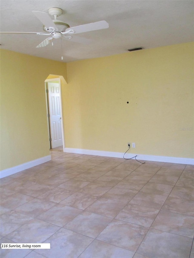 spare room featuring ceiling fan