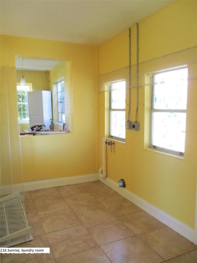 laundry room featuring plenty of natural light