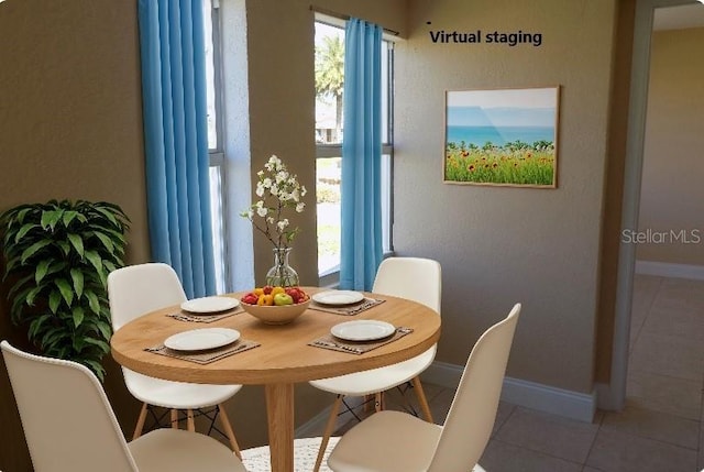 dining room with tile patterned floors