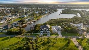 801 N Flagler Ave, Flagler Beach, FL 32136 - aerial view at dusk with a water view