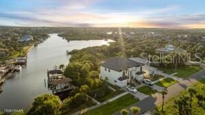 801 N Flagler Ave, Flagler Beach, FL 32136 - aerial view at dusk with a water view