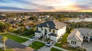 801 N Flagler Ave, Flagler Beach, FL 32136 - aerial view at dusk featuring a water view