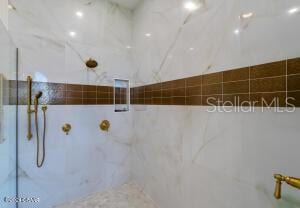801 N Flagler Ave, Flagler Beach, FL 32136 - bathroom with tiled shower