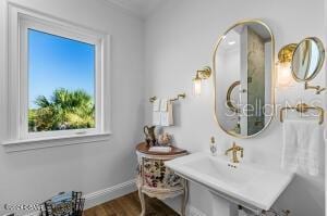 801 N Flagler Ave, Flagler Beach, FL 32136 - bathroom featuring hardwood / wood-style floors