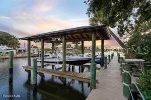 801 N Flagler Ave, Flagler Beach, FL 32136 - view of dock featuring a water view