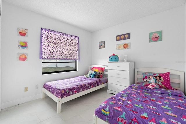 bedroom with a textured ceiling