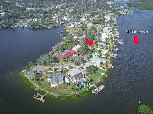 birds eye view of property featuring a water view