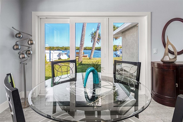 dining area with a water view