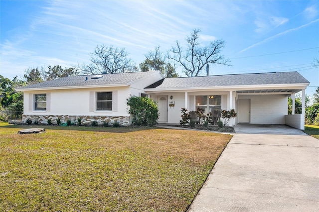 single story home with a carport and a front yard