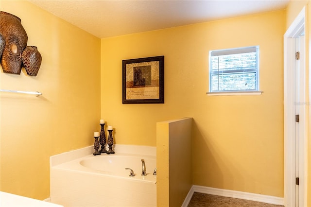 bathroom featuring a tub