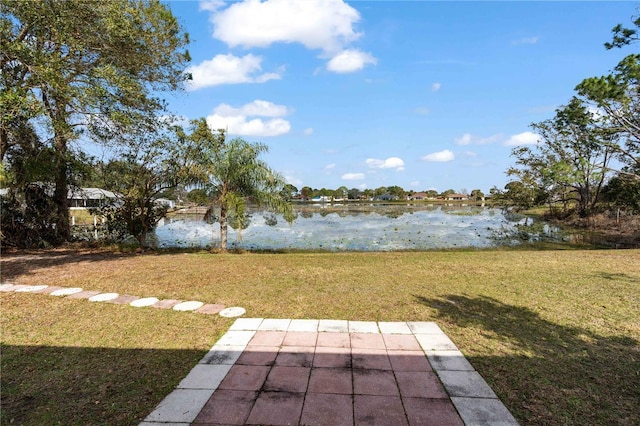 view of yard with a water view