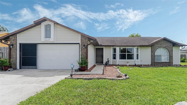 ranch-style home featuring a garage and a front lawn