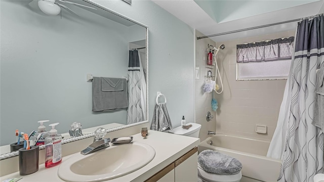 full bathroom featuring vanity, shower / tub combo, and toilet