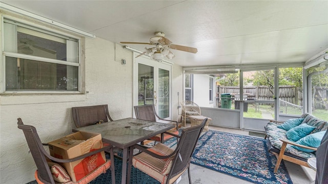 sunroom / solarium with ceiling fan