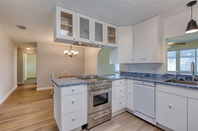 kitchen with white cabinetry, stainless steel electric stove, and dishwasher