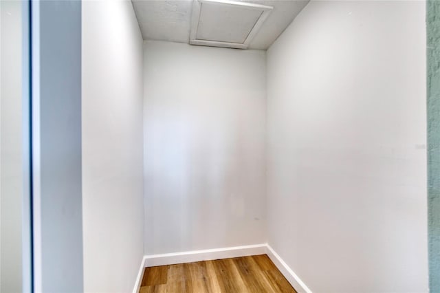 unfurnished room featuring hardwood / wood-style flooring