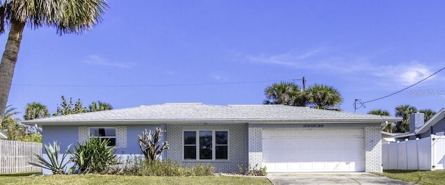 ranch-style home with a garage