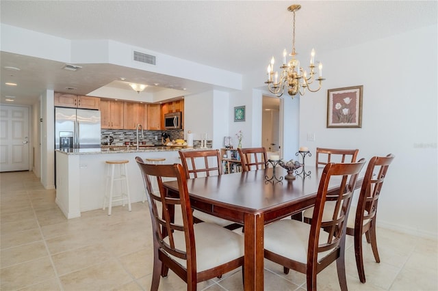 tiled dining area with sink