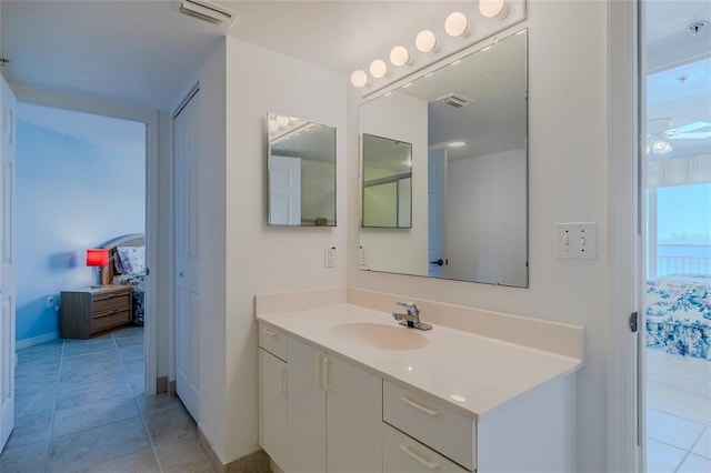 bathroom featuring vanity and tile patterned flooring