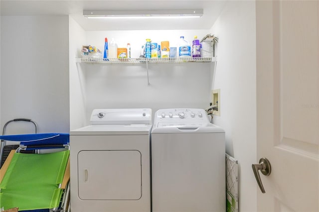 laundry area featuring washer and clothes dryer