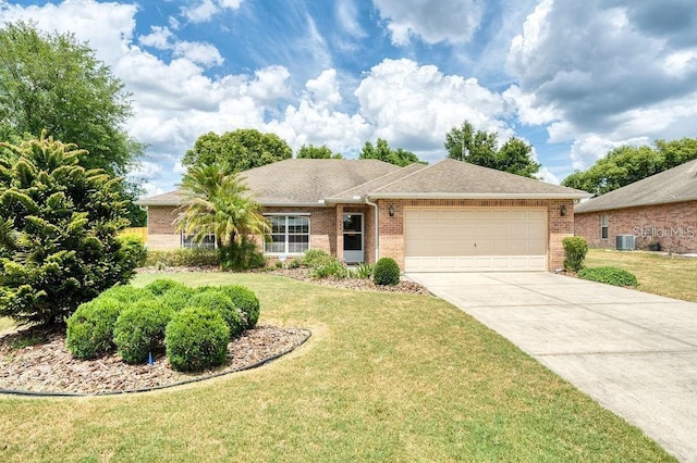 ranch-style house with a garage, a front yard, and central air condition unit