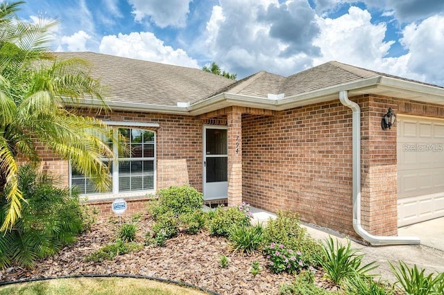 property entrance with a garage