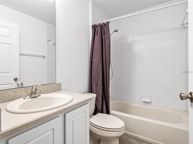 full bathroom featuring tile patterned flooring, vanity, shower / bath combination with curtain, a textured ceiling, and toilet