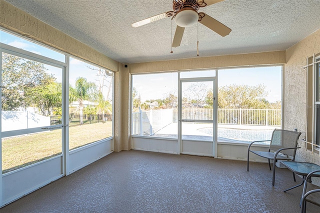 sunroom / solarium with ceiling fan