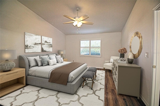 bedroom featuring lofted ceiling, hardwood / wood-style floors, and ceiling fan