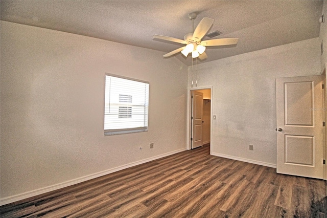 unfurnished room featuring ceiling fan and dark hardwood / wood-style floors