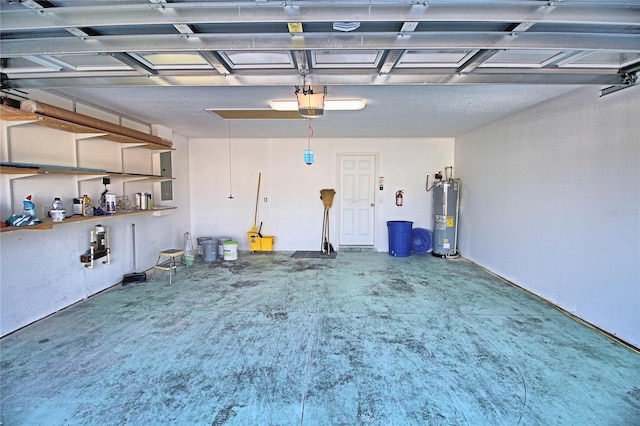 garage with water heater and a garage door opener