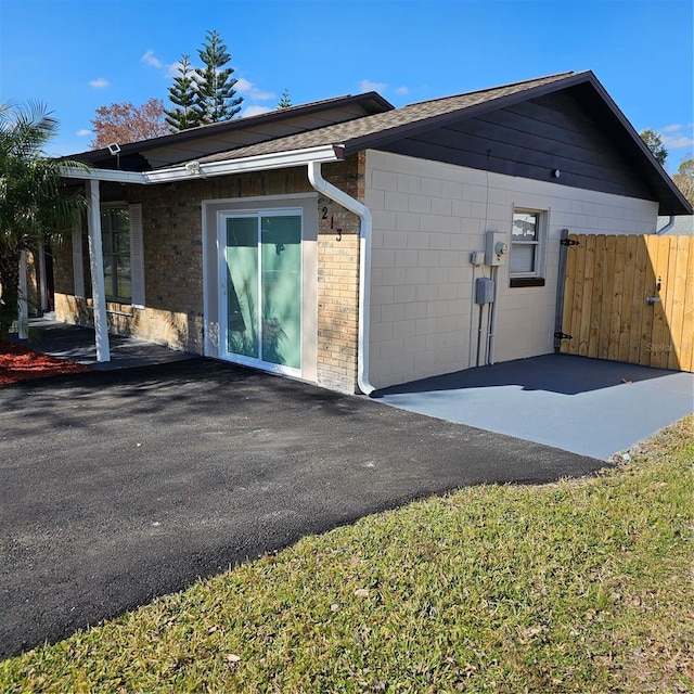 view of home's exterior with a patio