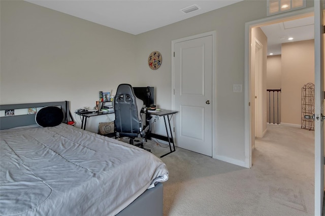 bedroom featuring light carpet