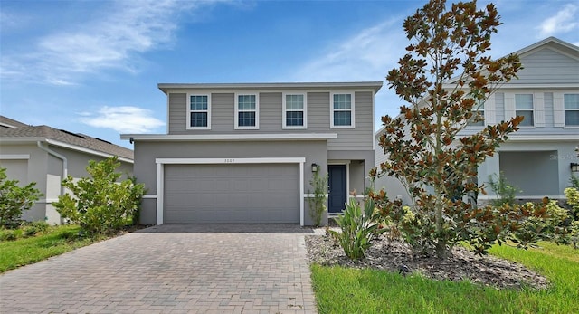 view of front of home with a garage