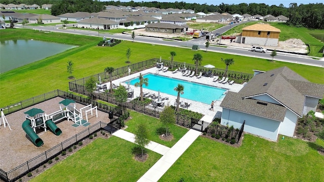 birds eye view of property featuring a water view