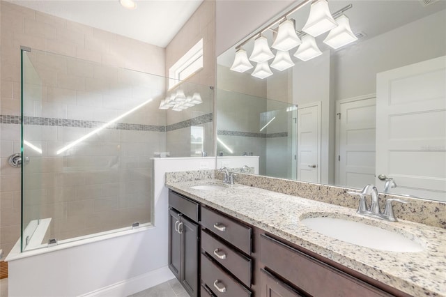 bathroom with vanity and tile patterned floors