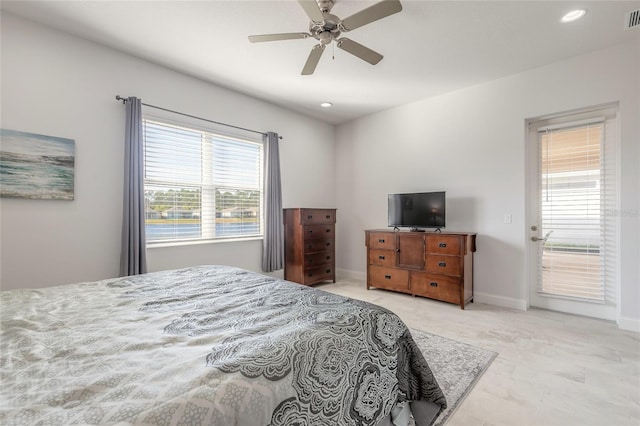 bedroom featuring access to outside and ceiling fan