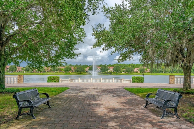 view of home's community with a water view