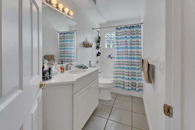 full bathroom featuring vanity, toilet, tile patterned flooring, and shower / tub combo